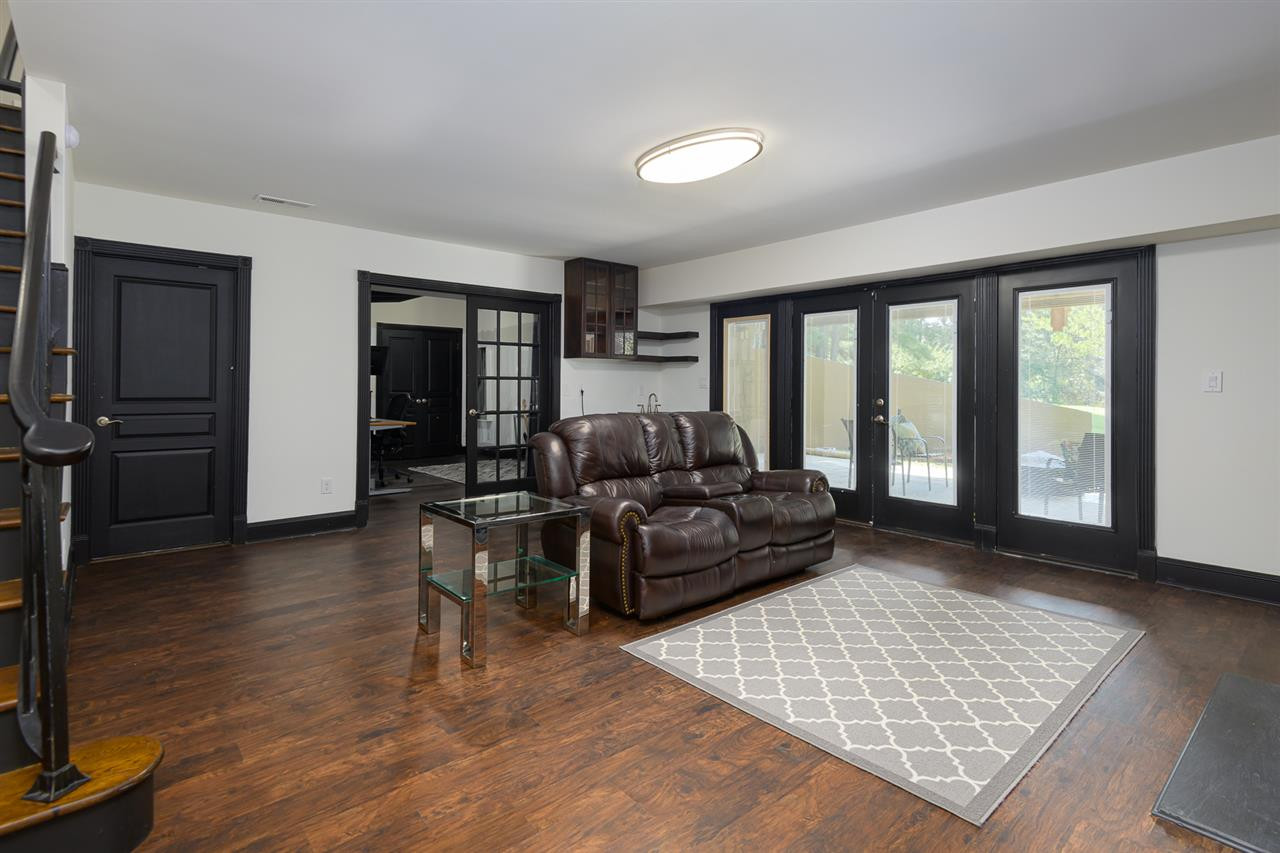 1000 Streeter Lane Raleigh, NC 27614 - Photo 21 of 30 a living room with furniture and a rug