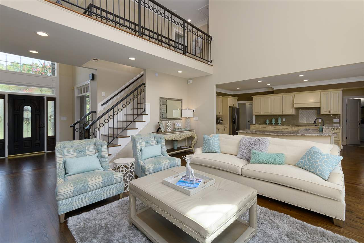 1000 Streeter Lane Raleigh, NC 27614 - Photo 7 of 30 a living room with furniture and a wooden floor