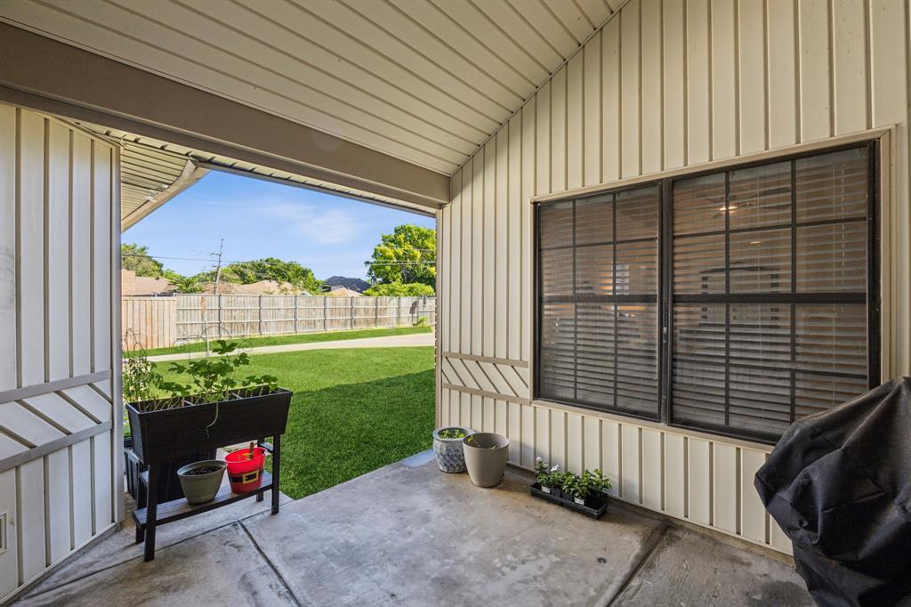 226 East Ridgegate Drive Garland, TX 75040 - Photo 23 of 25 a porch with seating space