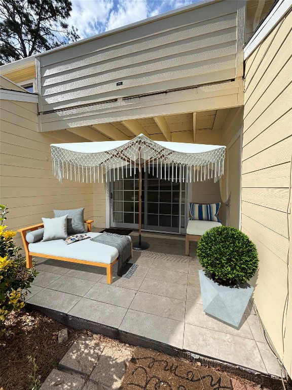 a view of a house with patio