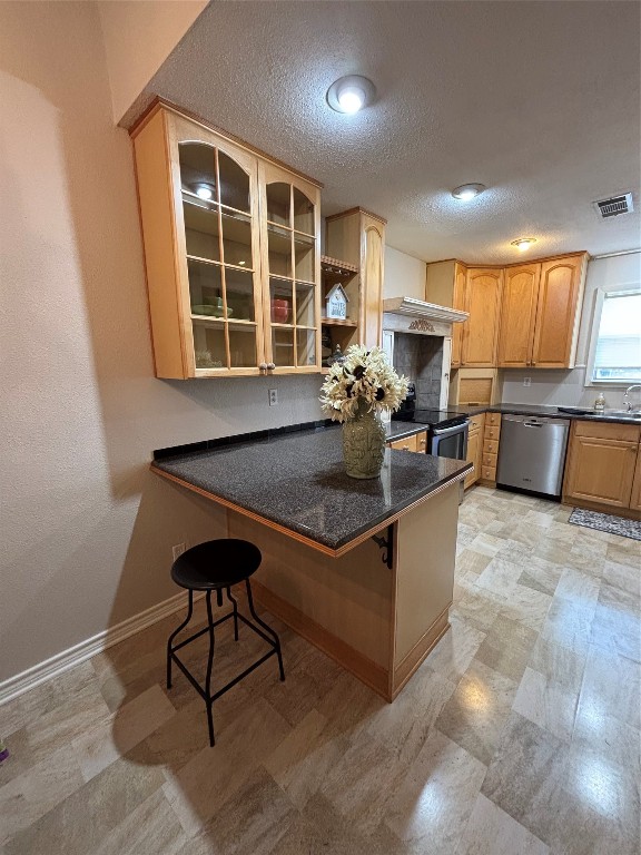 14515 Wunderlich Drive, Unit 315 Houston, TX 77069 - Photo 12 of 37 a kitchen with sink cabinets and window