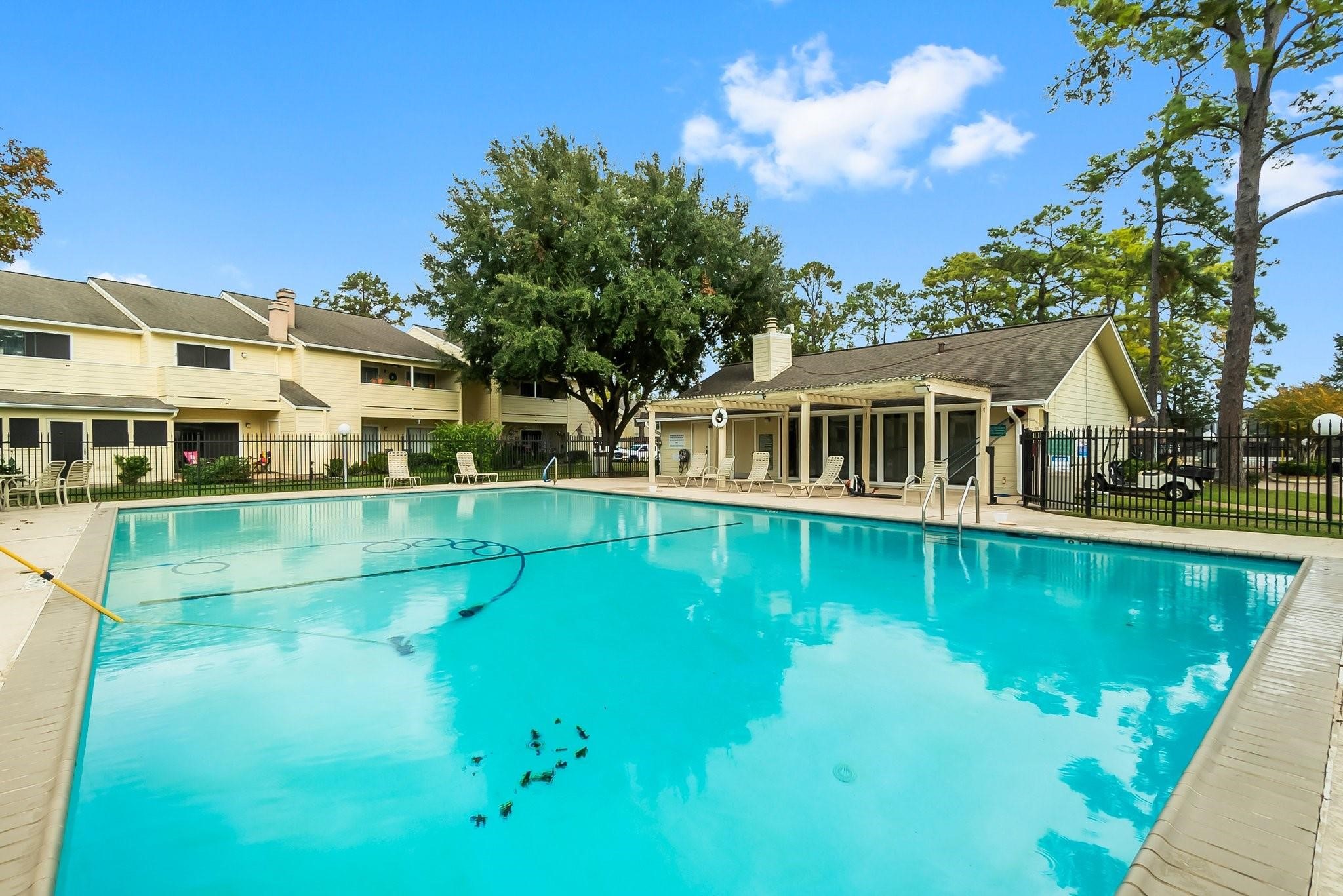 14515 Wunderlich Drive, Unit 315 Houston, TX 77069 - Photo 35 of 37 a view of a house with pool and a yard