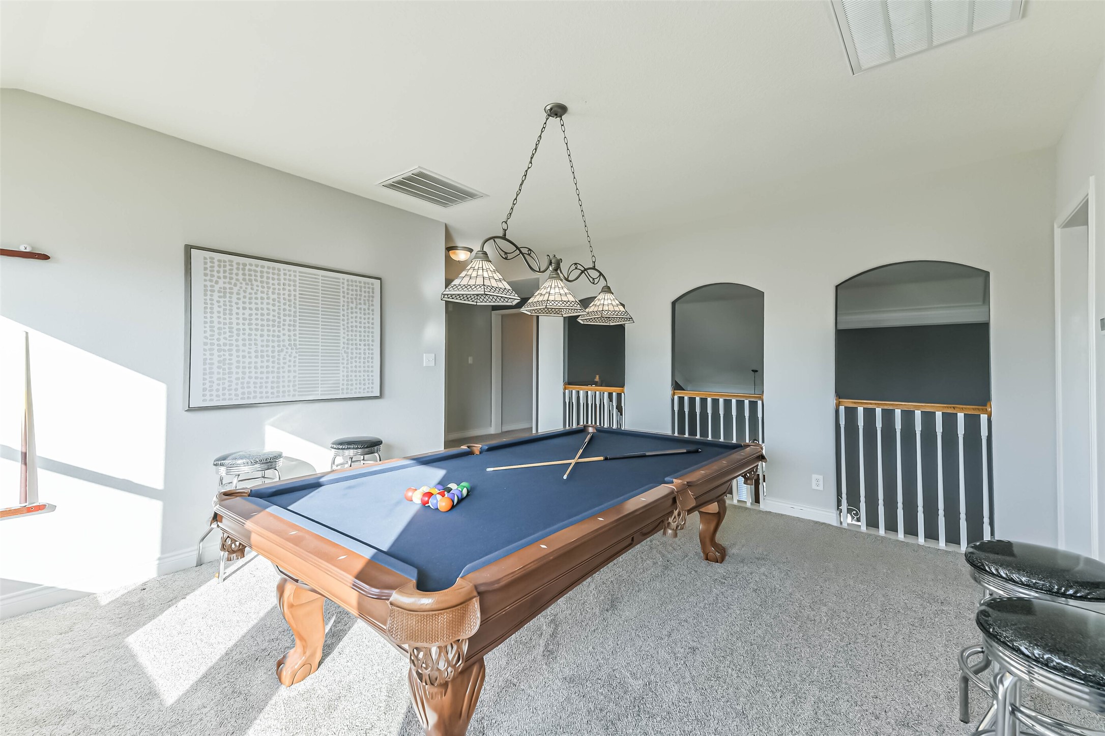 19022 Greenleaf Ridge Court Cypress, TX 77429 - Photo 5 of 47 a living room with a chandelier furniture and a chandelier