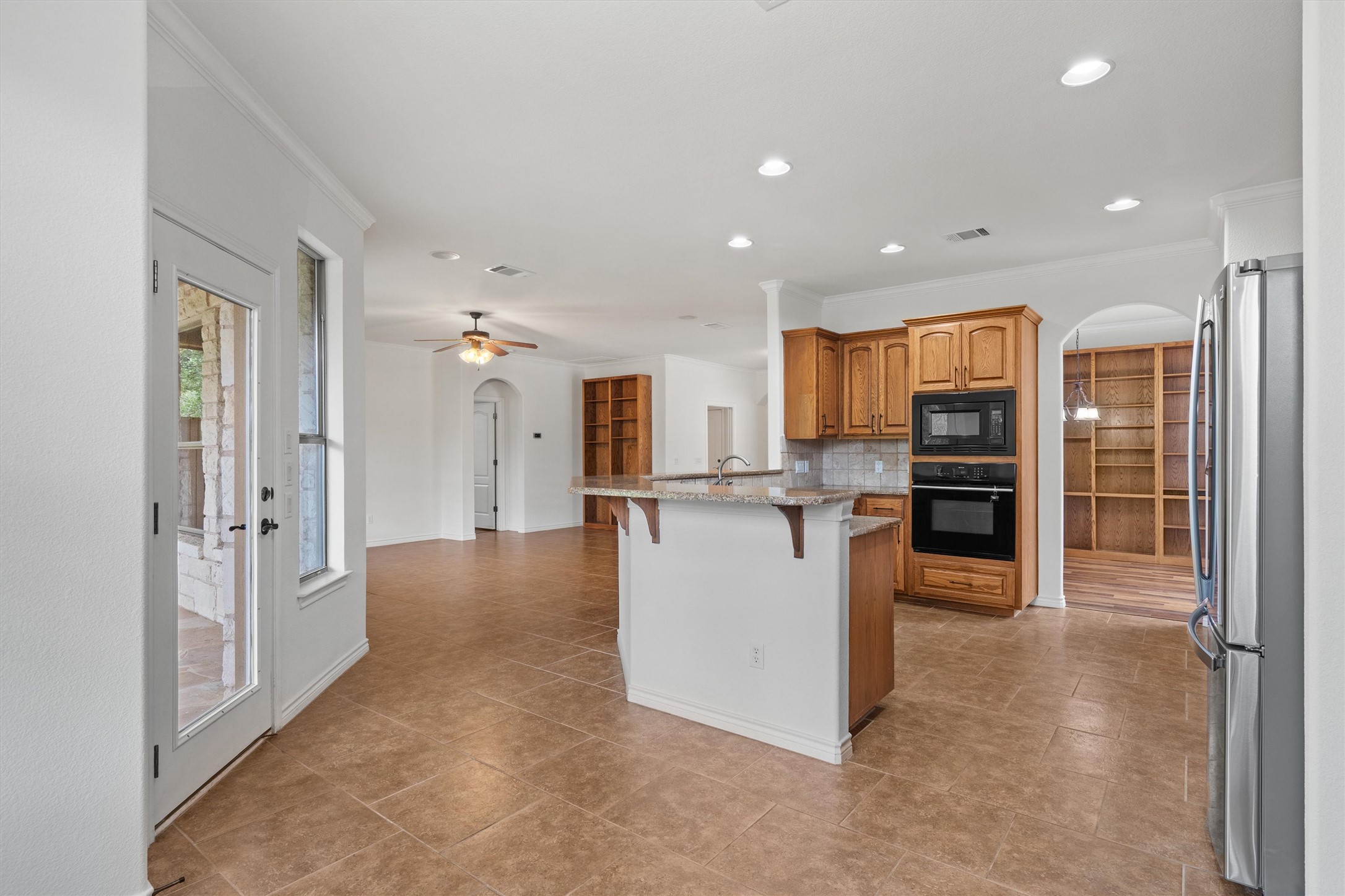 4612 Sonora Trace Georgetown, TX 78633 - Photo 20 of 36 a view of kitchen with furniture and refrigerator
