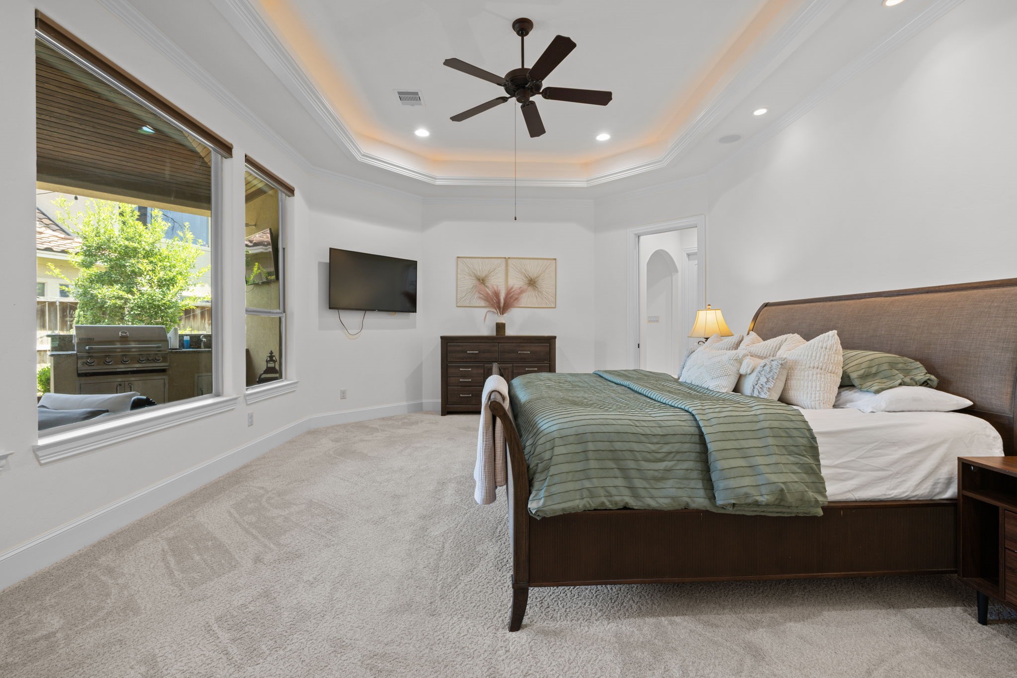 58 Shadow Creek Ridge Drive Spring, TX 77389 - Photo 25 of 49 Primary bedroom with high ceilings and views of the backyard