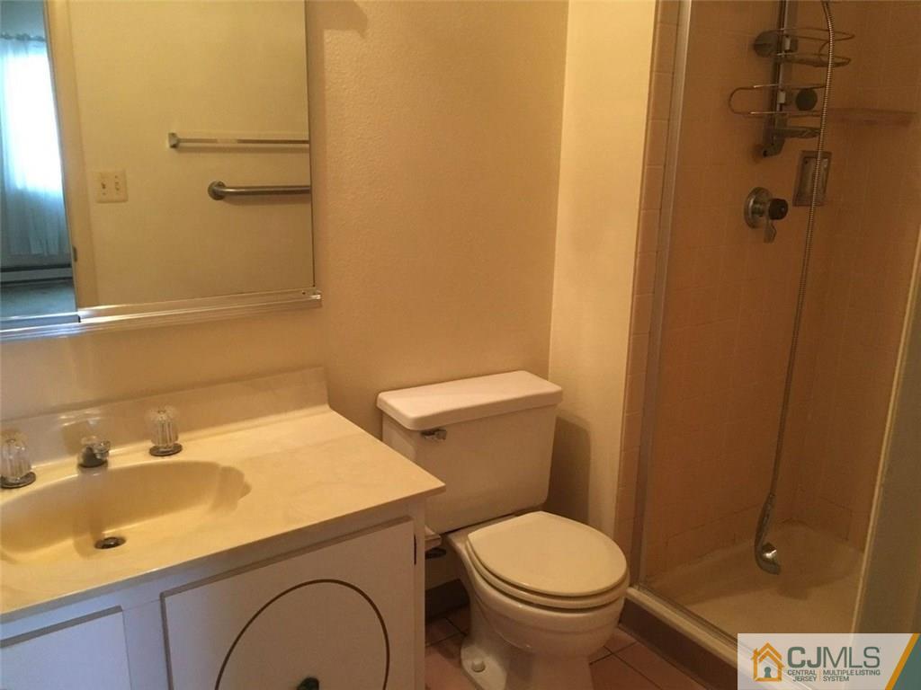 440 B Belford Road Monroe Township, NJ 08831 - Photo 13 of 13 a bathroom with a sink and a toilet