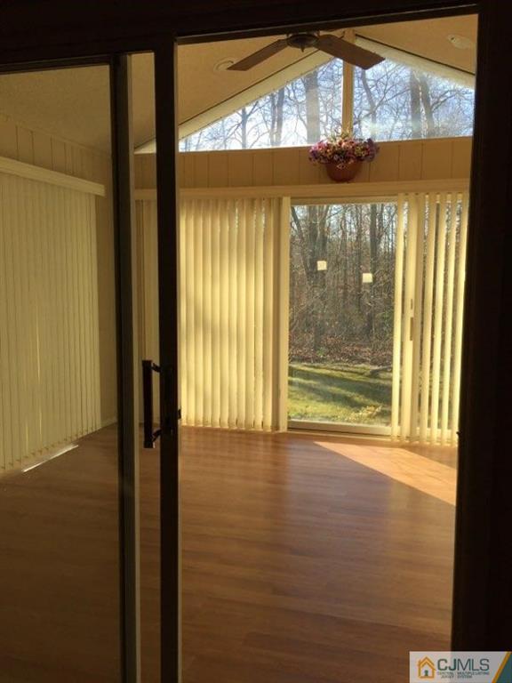 440 B Belford Road Monroe Township, NJ 08831 - Photo 4 of 13 a view of an empty room with a window