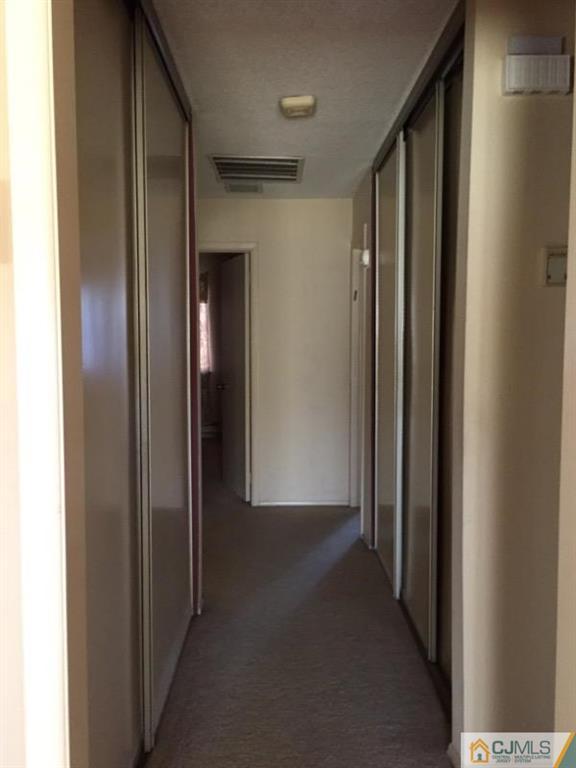 440 B Belford Road Monroe Township, NJ 08831 - Photo 6 of 13 a view of hallway with hallway