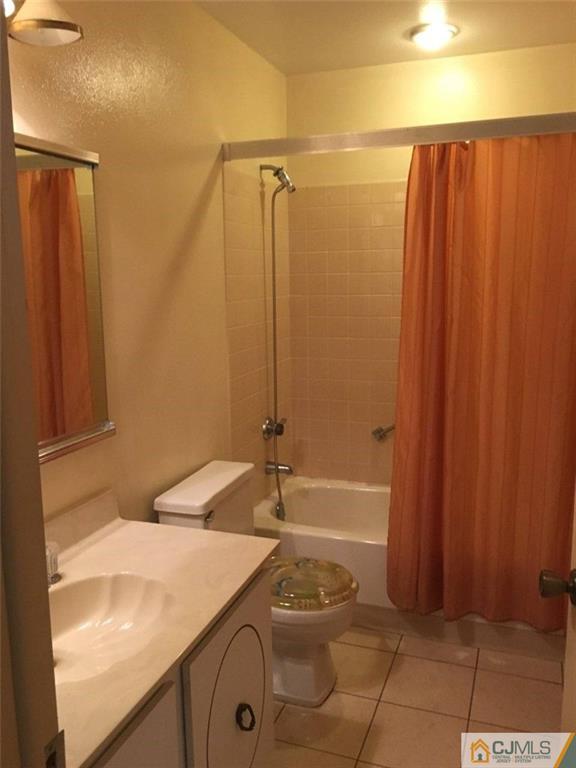440 B Belford Road Monroe Township, NJ 08831 - Photo 10 of 13 a bathroom with a sink and a shower