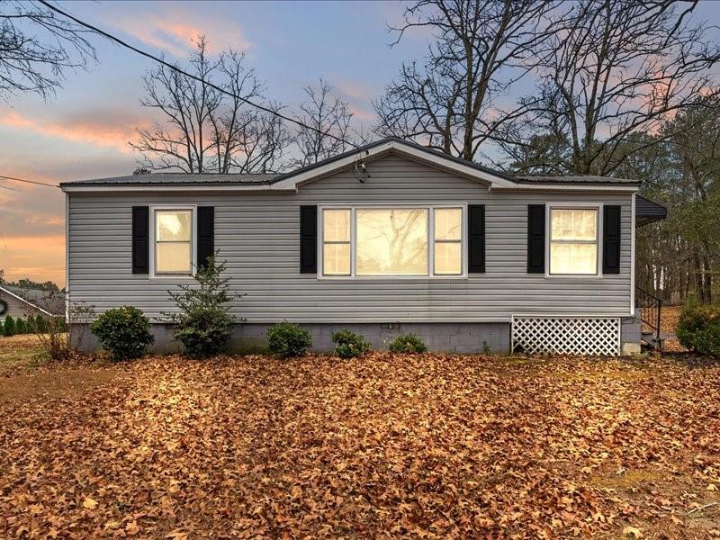 4624 Macland Road Hiram, GA 30141 - Photo 1 of 30 a front view of a house with a yard