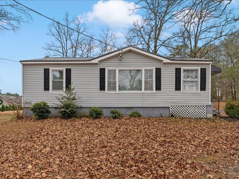 4624 Macland Road Hiram, GA 30141 - Photo 3 of 30 a front view of a house with a garden
