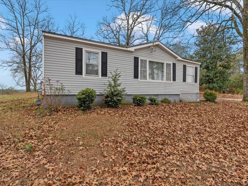 4624 Macland Road Hiram, GA 30141 - Photo 5 of 30 a front view of a house with garden