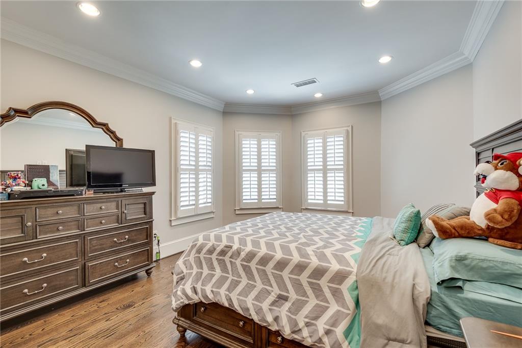 187 Fontaine Road Southwest Mableton, GA 30126 - Photo 47 of 84 a bedroom with a bed and wooden floor