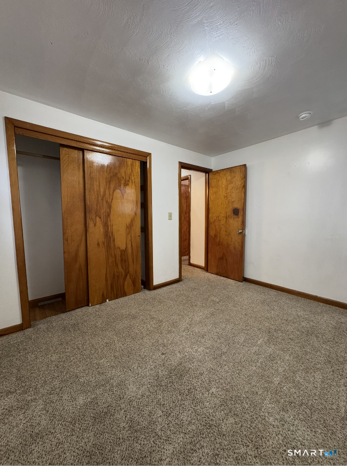 16 Grove Street New London, CT 06320 - Photo 11 of 12 a view of an empty room and window