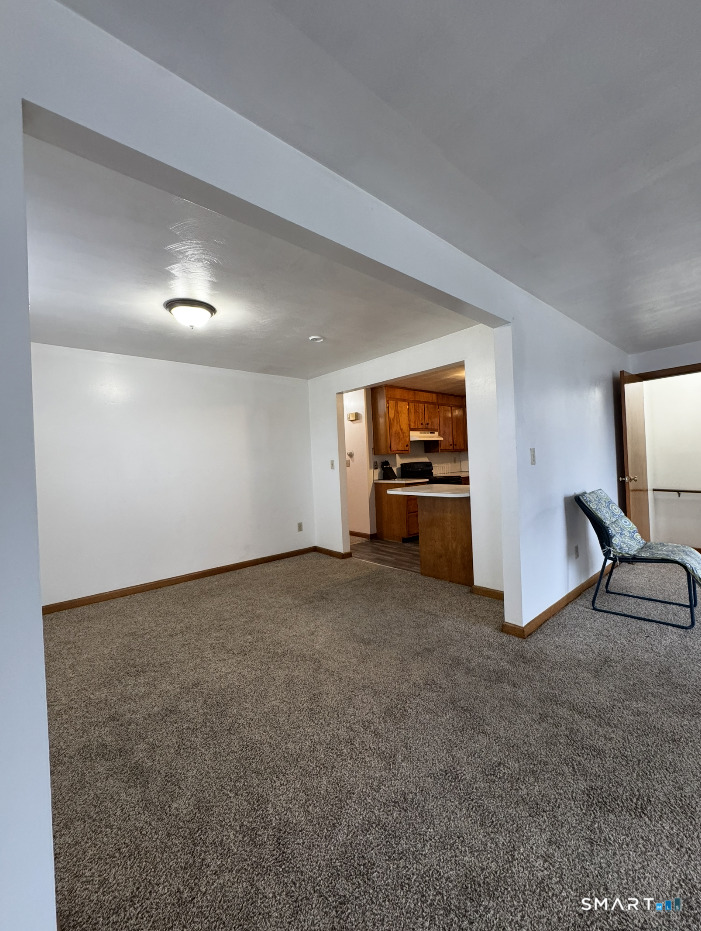 16 Grove Street New London, CT 06320 - Photo 5 of 12 a view of a livingroom with furniture