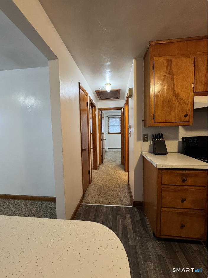 16 Grove Street New London, CT 06320 - Photo 6 of 12 a en suite bathroom with a sink and a mirror