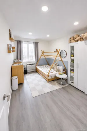 a living room with furniture and white walls