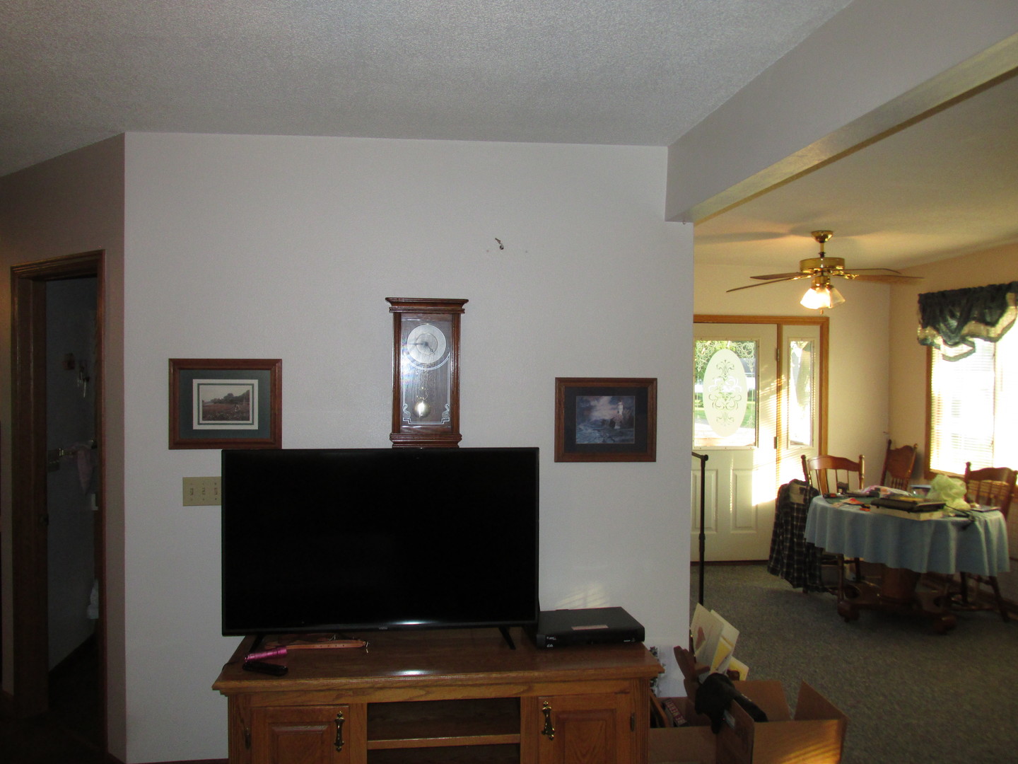 1844 Center Street Lee Center, IL 61310 - Photo 10 of 27 a living room with furniture and a flat screen tv