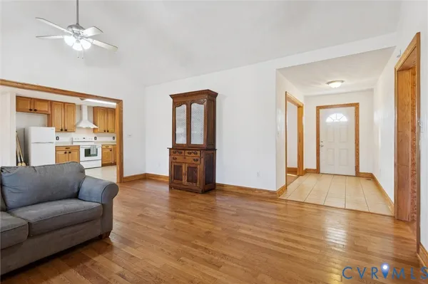 a view of livingroom with furniture wooden floor and window