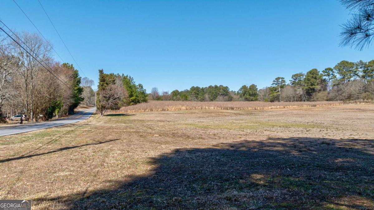 304 Kent Rock Road, Unit TRACT 3 Loganville, GA 30052 - Photo 2 of 16 a view of an ocean beach