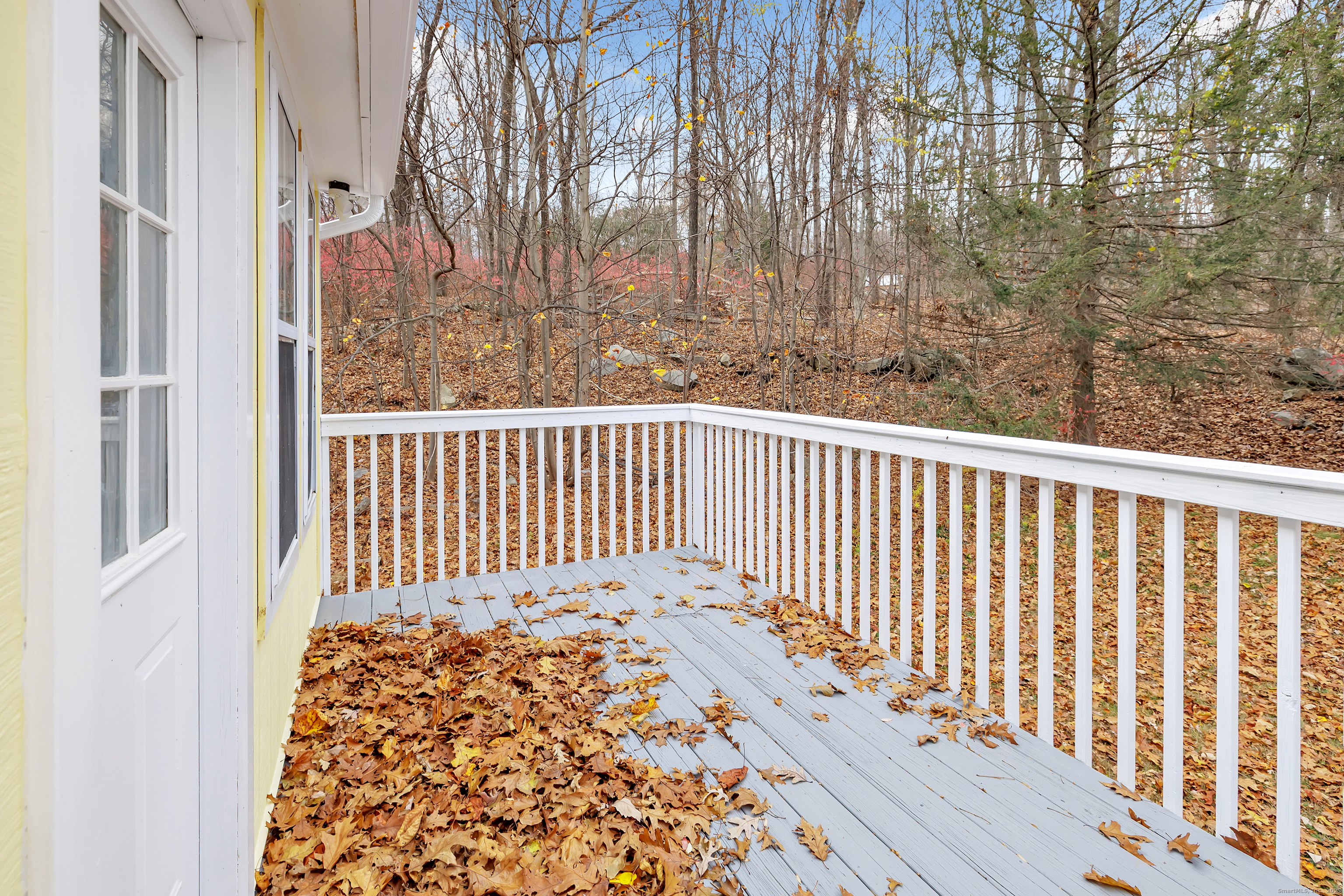 76 Dorman Road Oxford, CT 06478 - Photo 25 of 39 a view of a balcony with wooden floor
