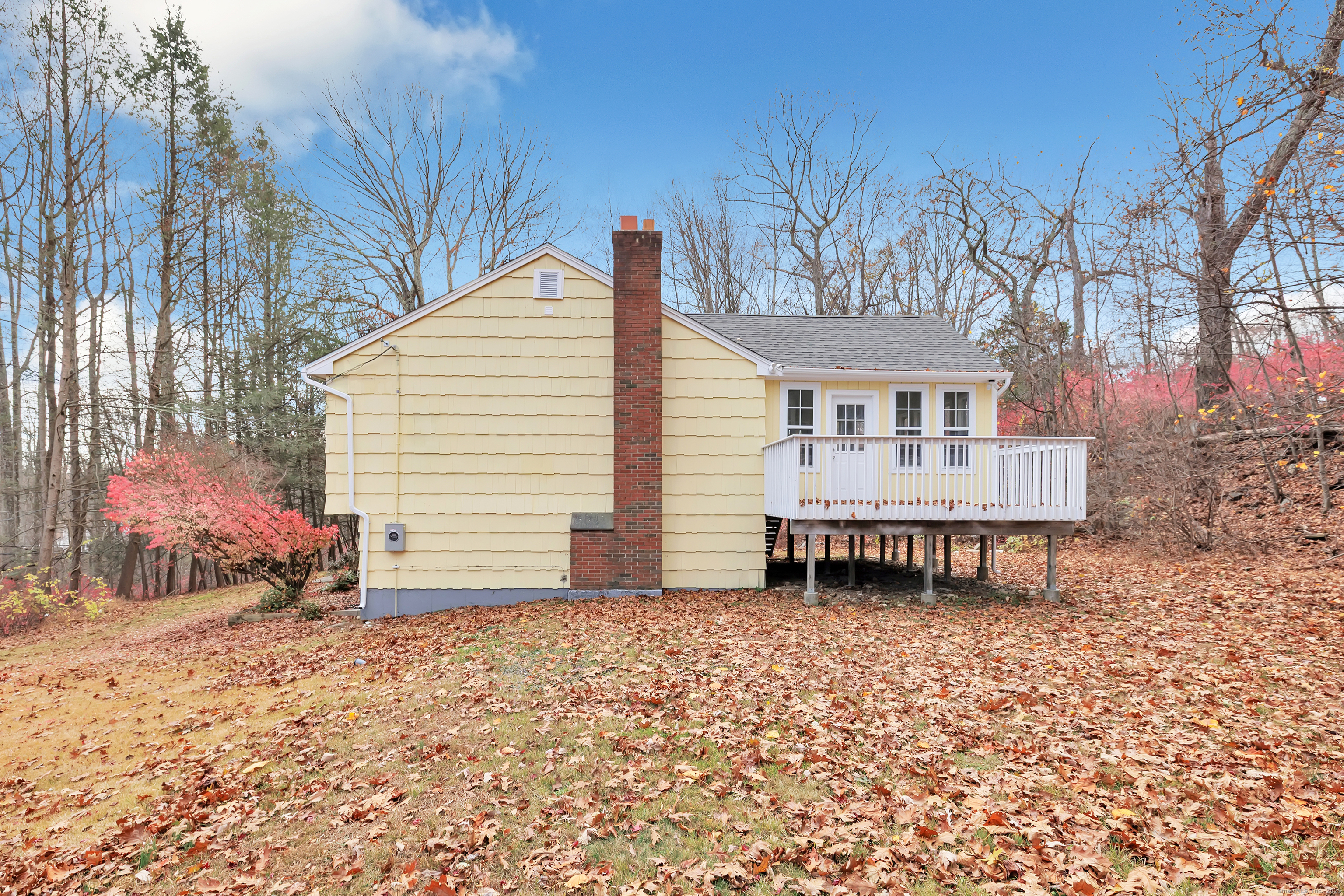 76 Dorman Road Oxford, CT 06478 - Photo 7 of 39 a backyard of a house with table and chairs