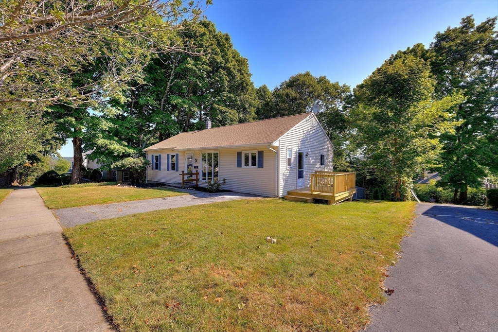 25 Tahanto Road Worcester, MA 01602 - Photo 1 of 35 a front view of house with yard and trees
