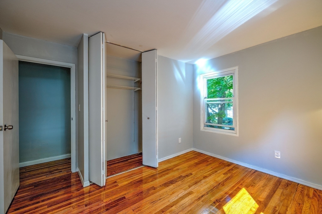 25 Tahanto Road Worcester, MA 01602 - Photo 12 of 35 a view of empty room with wooden floor and fan