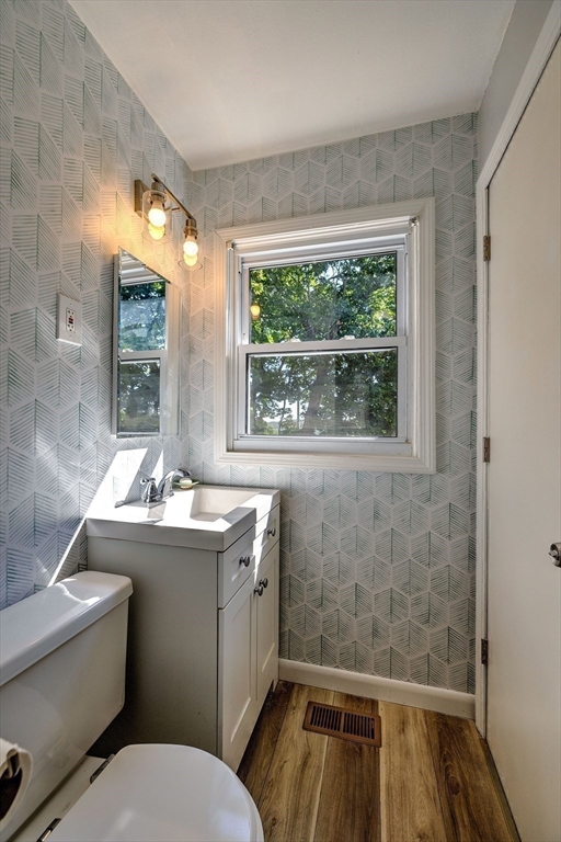 25 Tahanto Road Worcester, MA 01602 - Photo 14 of 35 a bathroom with a sink toilet and window