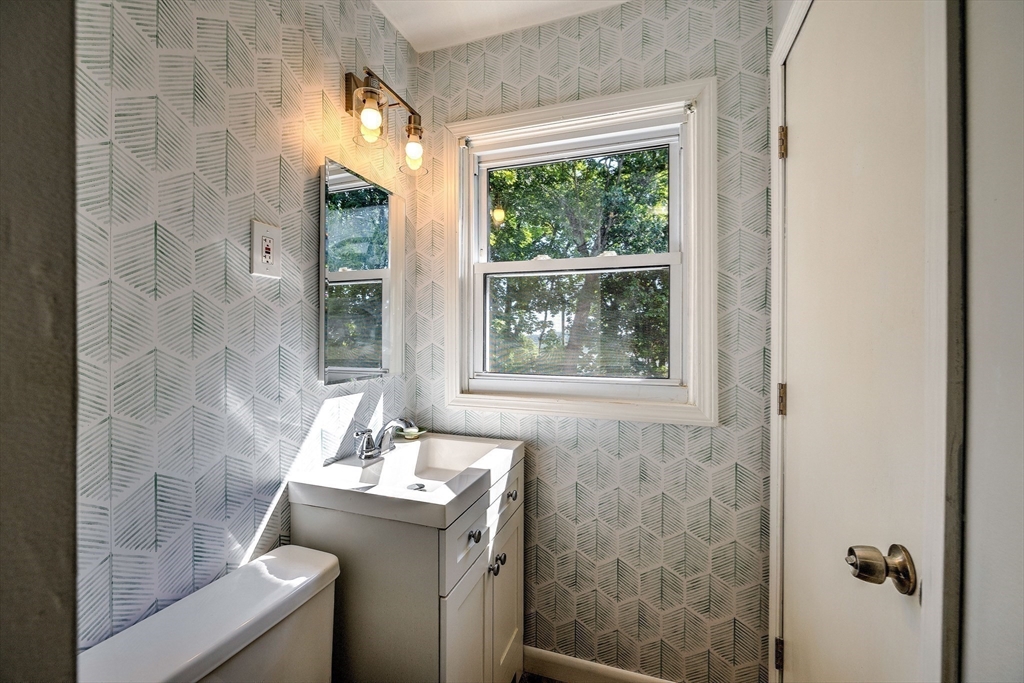 25 Tahanto Road Worcester, MA 01602 - Photo 15 of 35 a bathroom with a sink a toilet and shower