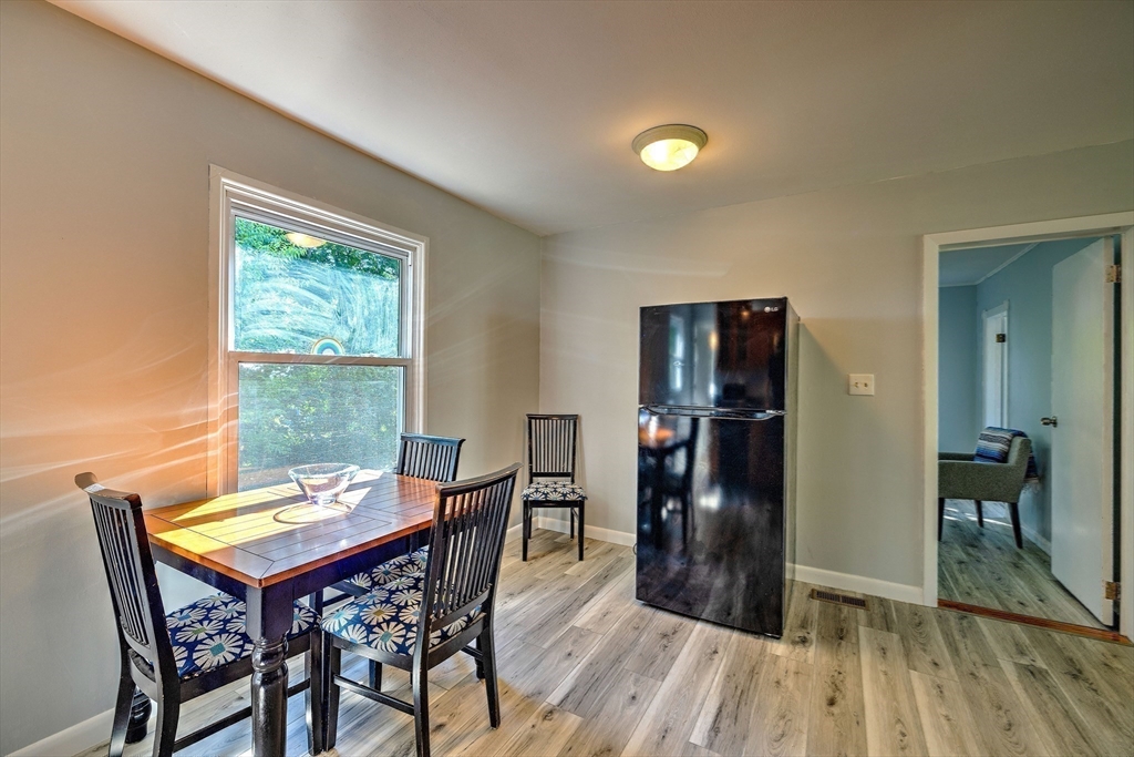 25 Tahanto Road Worcester, MA 01602 - Photo 17 of 35 a view of a dining room with furniture and wooden floor