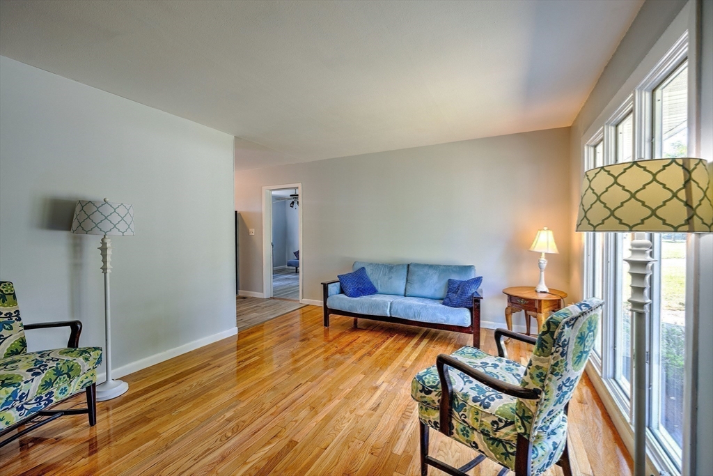 25 Tahanto Road Worcester, MA 01602 - Photo 25 of 35 a living room with furniture and a wooden floor