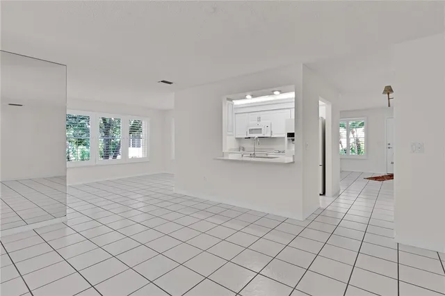 a view of an empty room and window