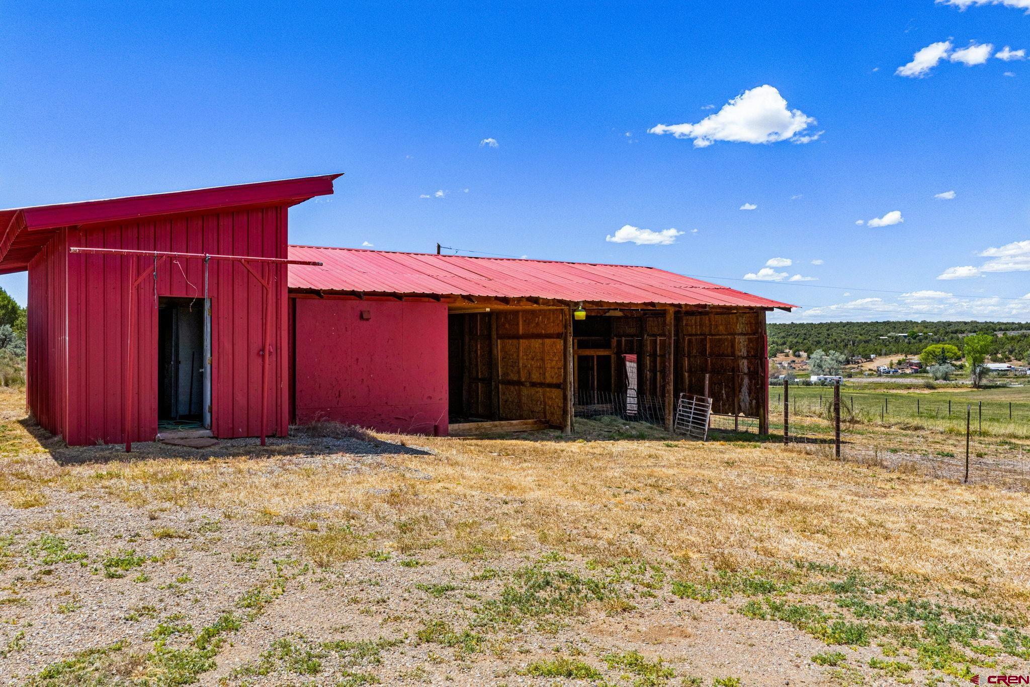 22480 Rd L Cortez, CO 81321 - Photo 34 of 44 a view of a backyard of the house