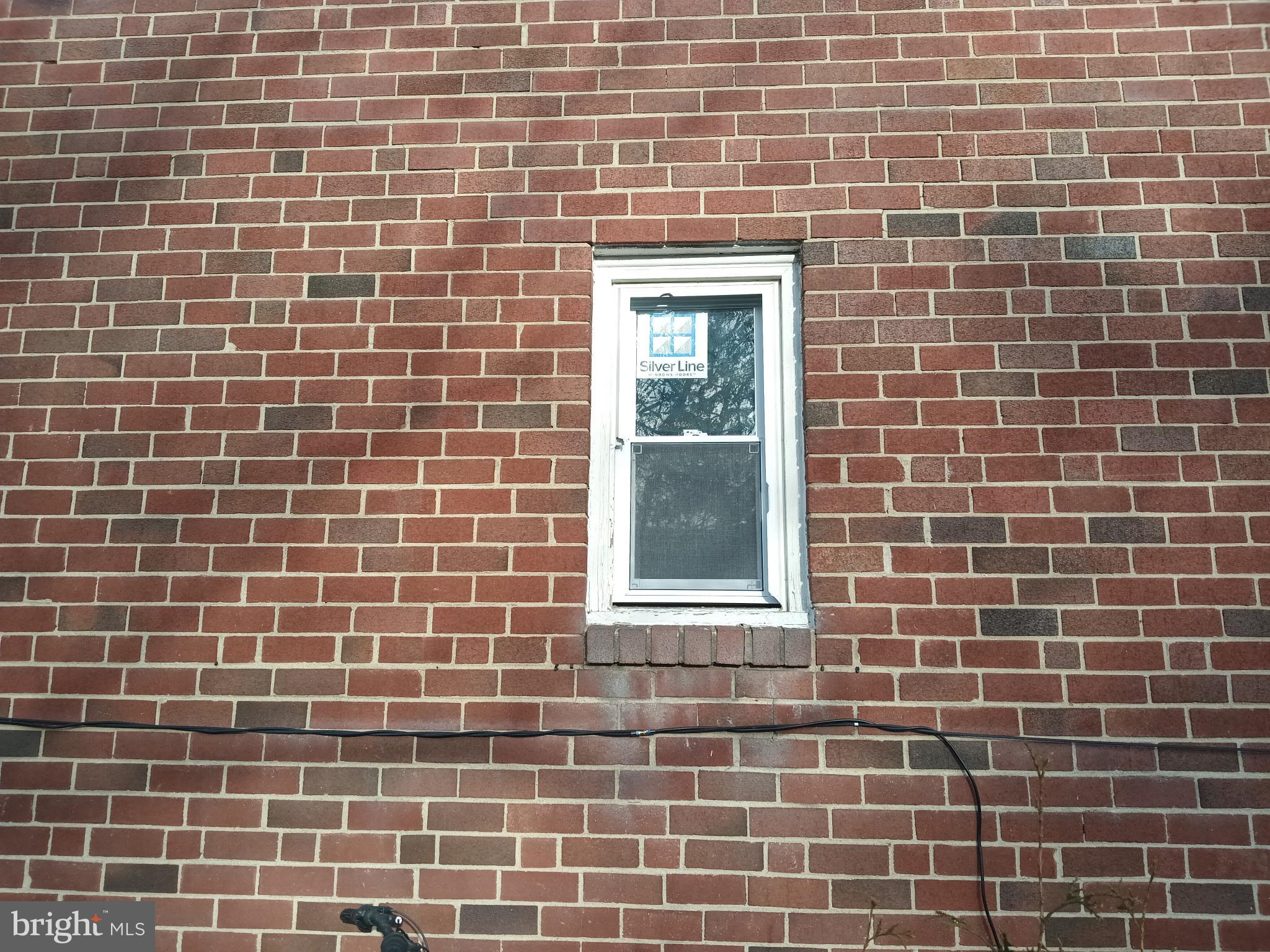 3419 Carter Lane Chester, PA 19013 - Photo 44 of 52 Charming brick facade with a new window.