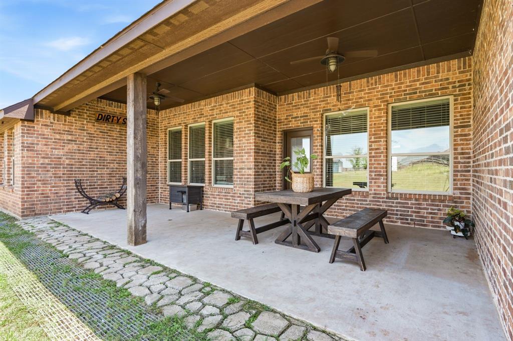 140 Heather Lane Decatur, TX 76234 - Photo 32 of 39 a building outdoor space with patio the couch and chairs