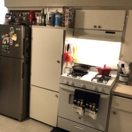 210-220 North 5th Street Central Point, OR 97502 - Photo 9 of 26 a stove top oven sitting inside of a kitchen