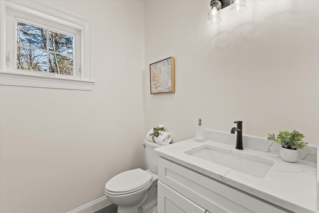 Lot 10 Matthew Circle Easton, MA 02356 - Photo 14 of 33 a bathroom with a sink a toilet and a mirror