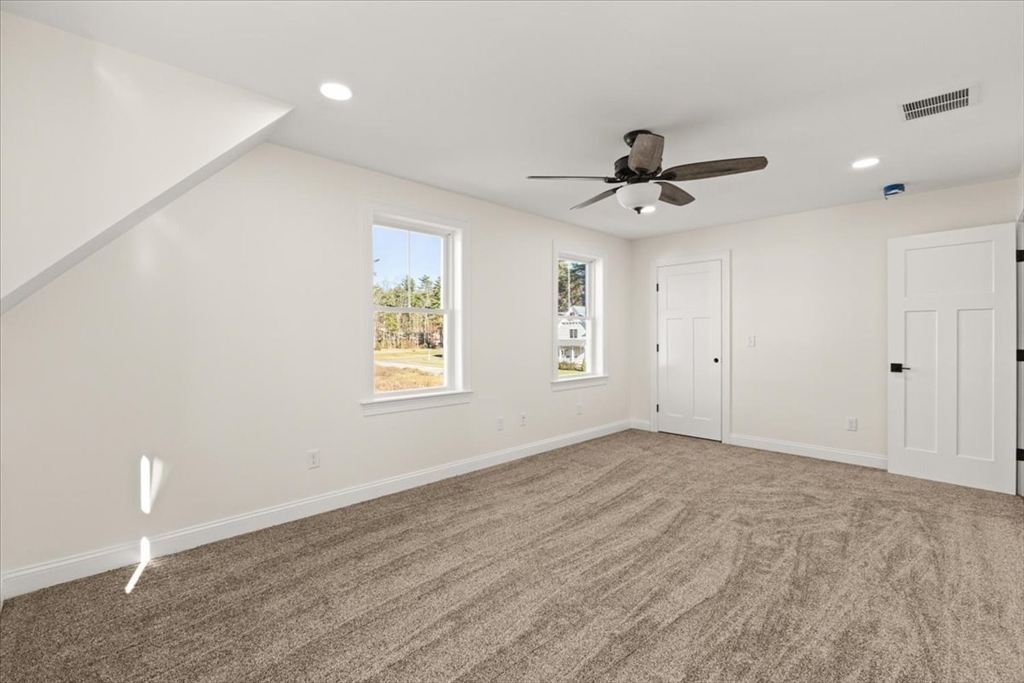 Lot 10 Matthew Circle Easton, MA 02356 - Photo 17 of 33 wooden floor in an empty room with a window