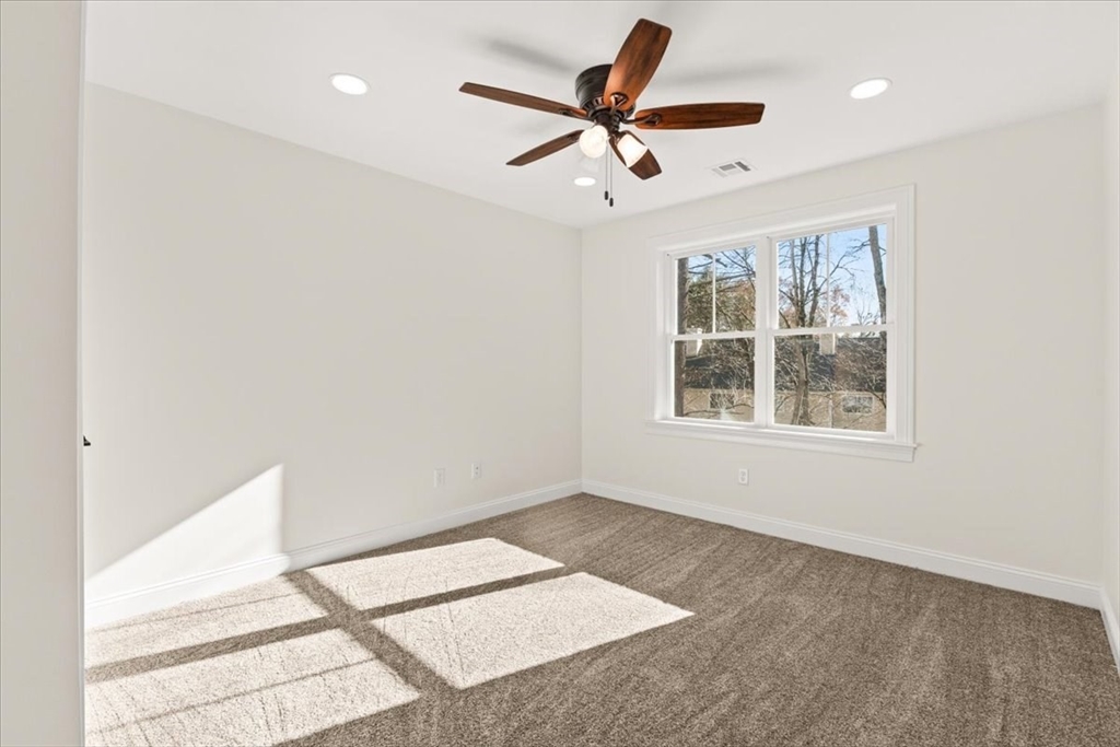Lot 10 Matthew Circle Easton, MA 02356 - Photo 18 of 33 a view of workspace with wooden floor and ceiling fan