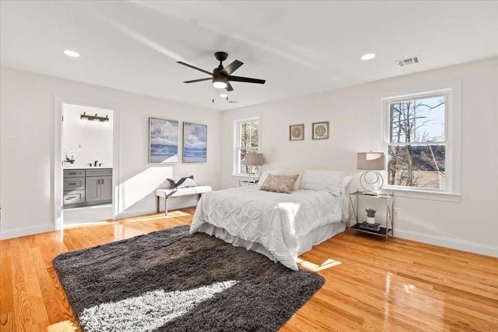 Lot 10 Matthew Circle Easton, MA 02356 - Photo 21 of 33 a spacious bedroom with a large bed and a window