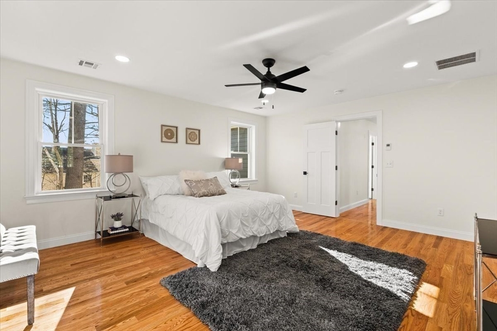 Lot 10 Matthew Circle Easton, MA 02356 - Photo 22 of 33 a bedroom with a large bed and a window