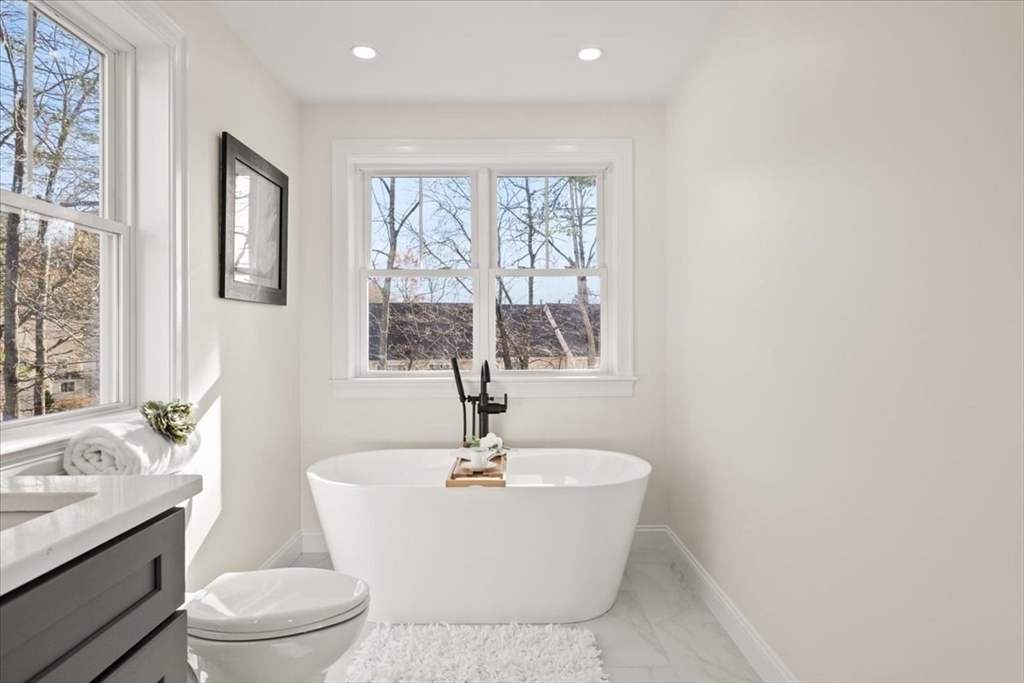 Lot 10 Matthew Circle Easton, MA 02356 - Photo 25 of 33 a white bath tub sitting next to a white toilet