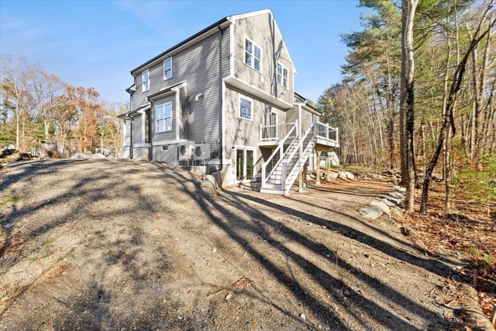 Lot 10 Matthew Circle Easton, MA 02356 - Photo 32 of 33 a view of a building with a yard