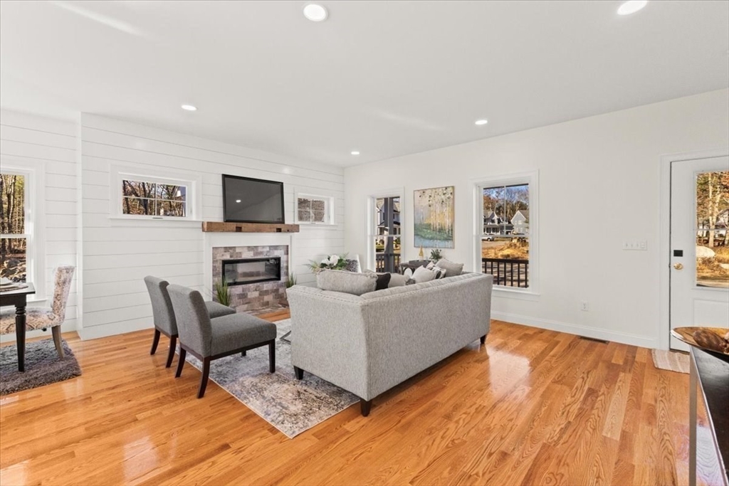 Lot 10 Matthew Circle Easton, MA 02356 - Photo 7 of 33 a living room with furniture and a flat screen tv