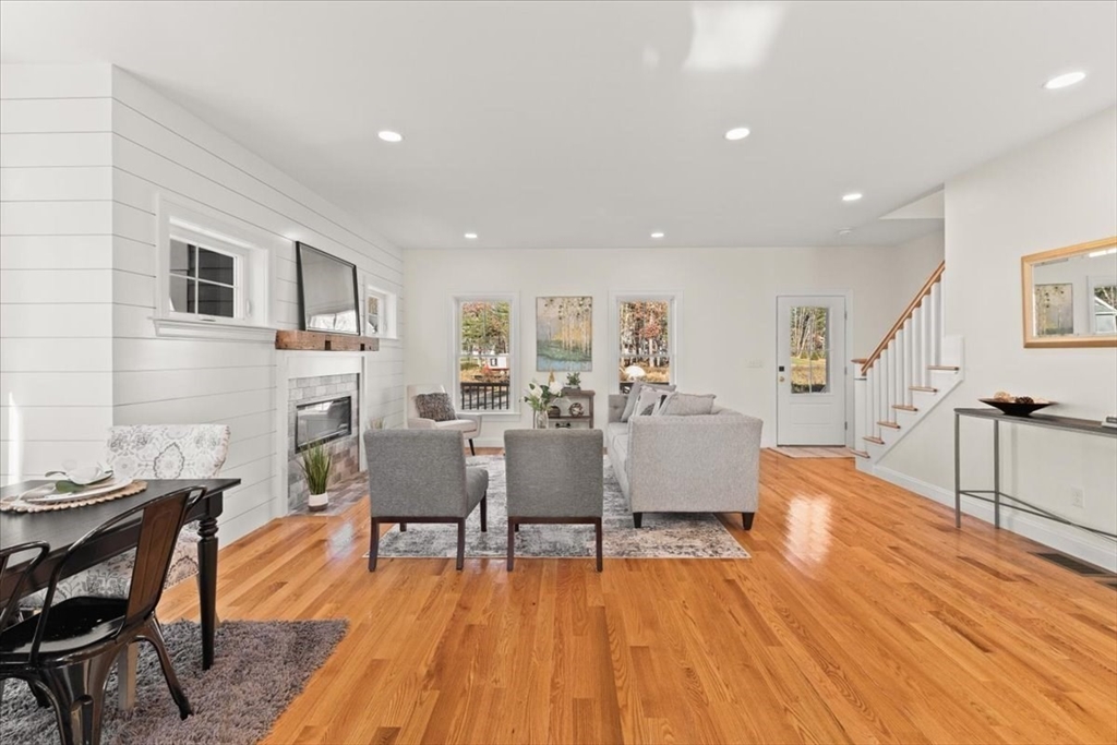 Lot 10 Matthew Circle Easton, MA 02356 - Photo 10 of 33 a living room with furniture and a wooden floor