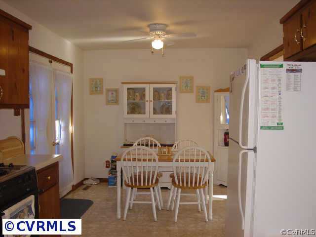 10501 Surry Road Chester, VA 23831 - Photo 8 of 10 a view of a dining room with furniture
