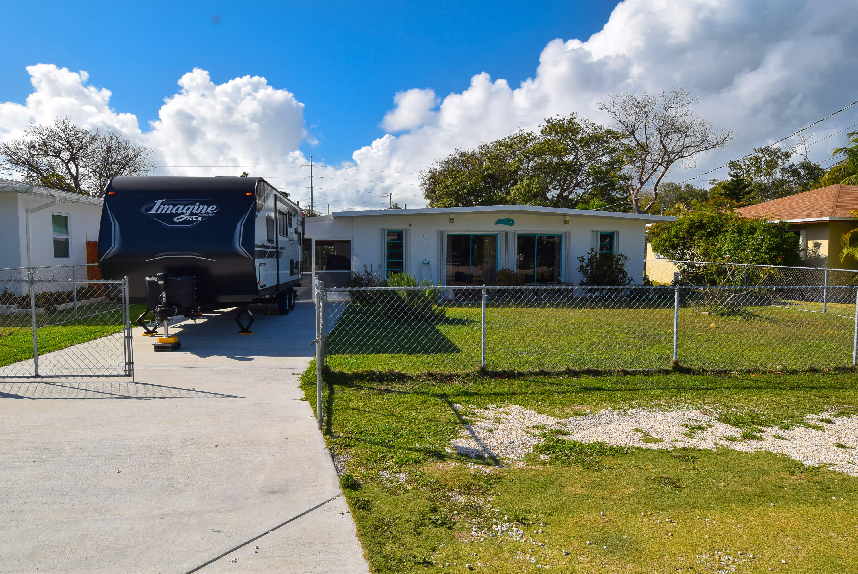 237 2nd Road Key Largo, FL 33037 - Photo 8 of 25 a view of a house with a yard