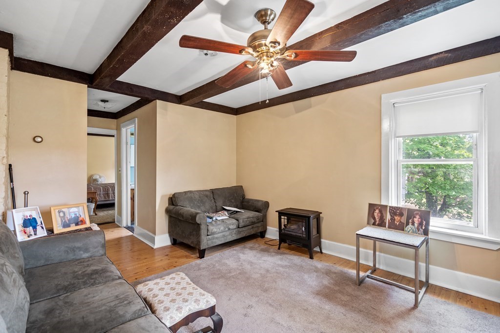 44 Stockbridge Road Scituate, MA 02066 - Photo 13 of 24 a living room with furniture and a window