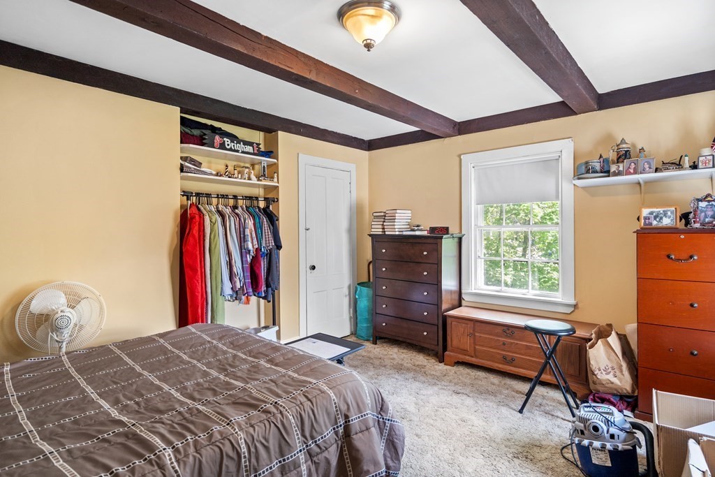 44 Stockbridge Road Scituate, MA 02066 - Photo 19 of 24 a bedroom with a bed and a closet